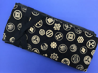 Quilted bow case with a zipper