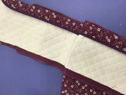 Quilted bow case with a zipper